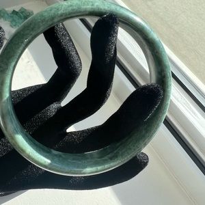 Olive green Jade bangle .